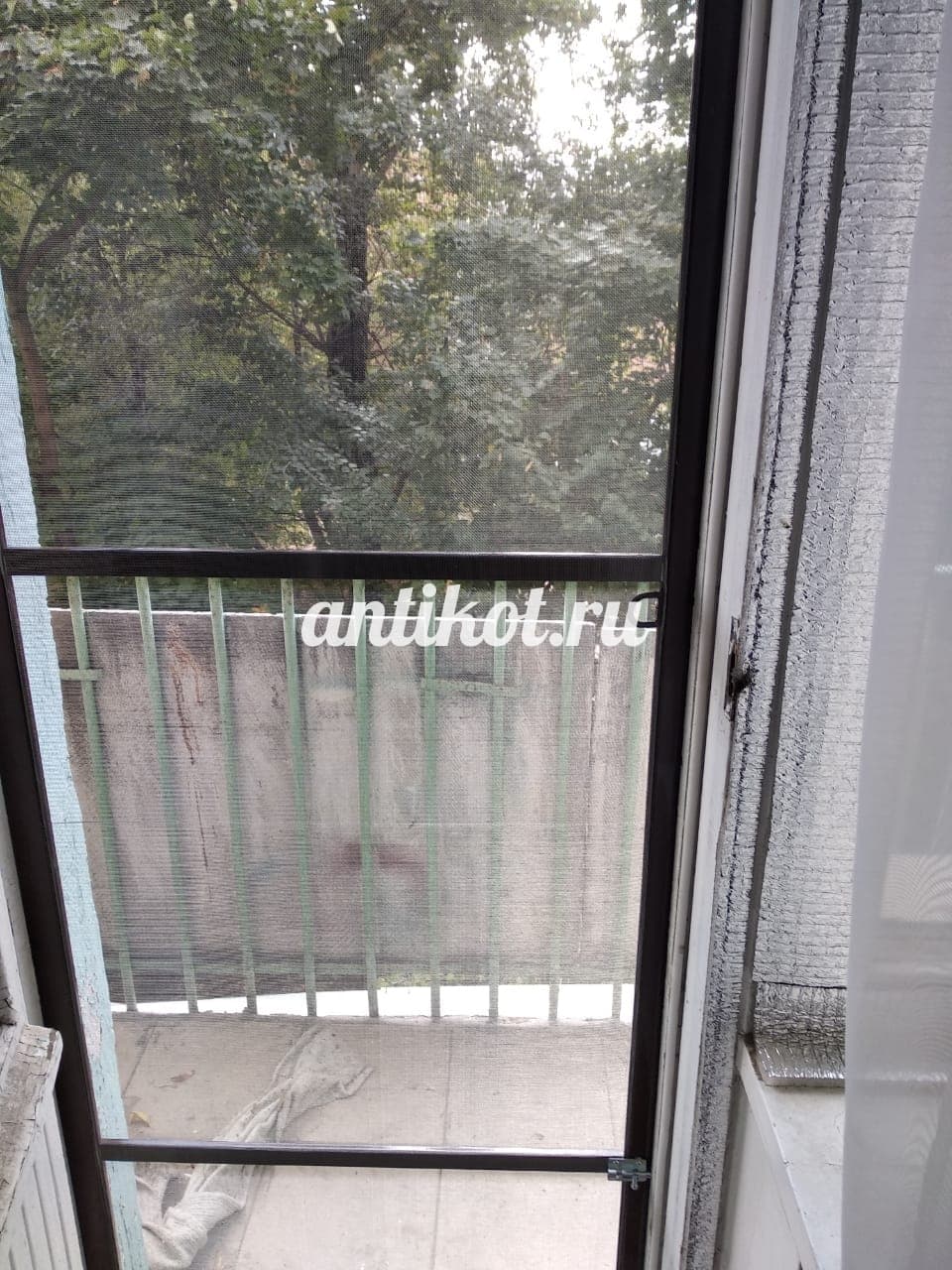 Дверь на балкон из нержавеющий стали